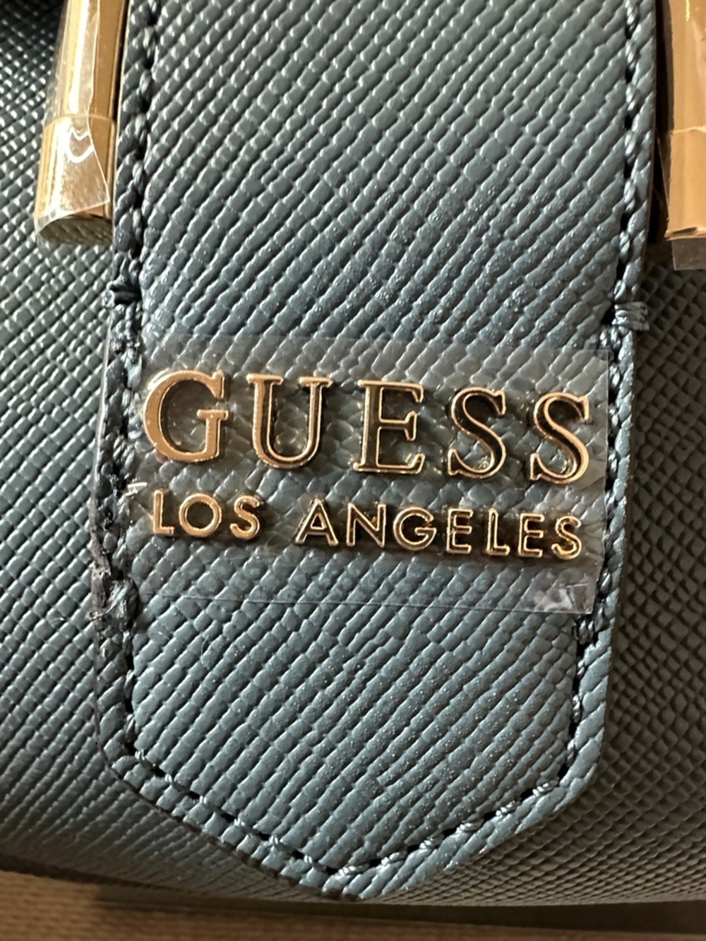 Guess Dark Denim Color Crossbody Saddle Bag with Gold Hardware - Picture 6 of 10